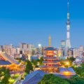 Tokyo skyline at dusk featuring Senso-ji Temple and Tokyo Skytree, showcasing the city’s blend of traditional and modern architecture.